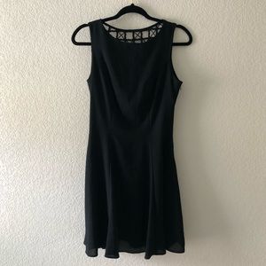Vintage black cocktail dress, elegant back detail